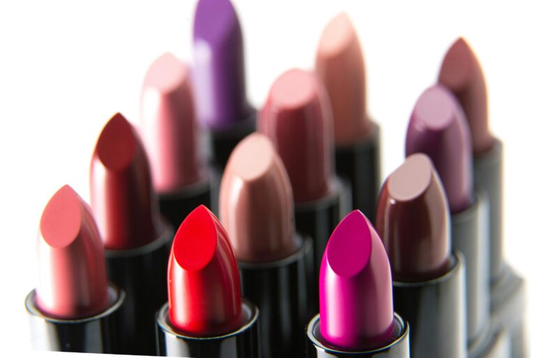 How to Choose the Perfect Brown & Nude Lipstick for Your Skin Tone Close-up image of various colorful lipsticks, ideal for beauty themes.