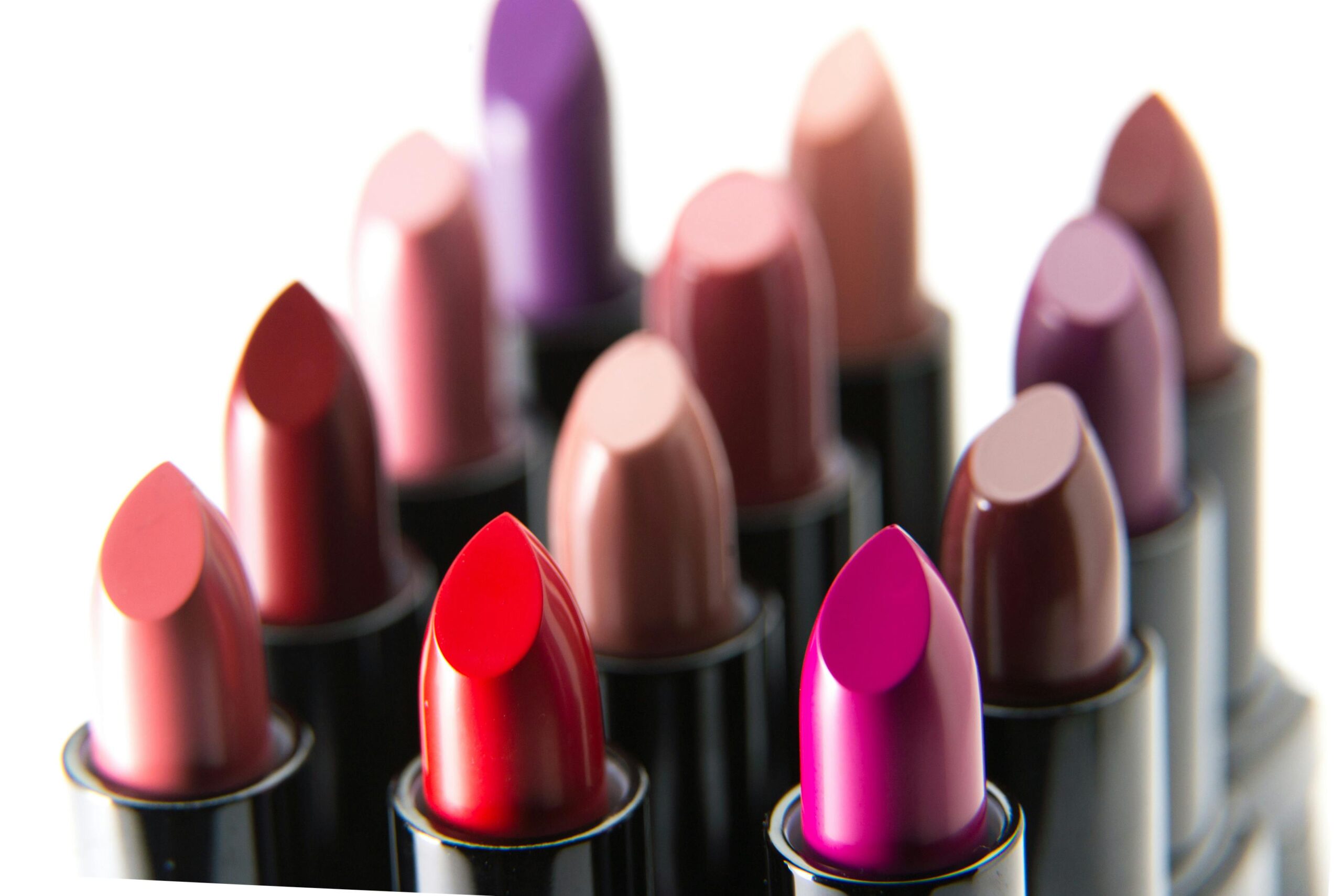 Close-up image of various colorful lipsticks, ideal for beauty themes.